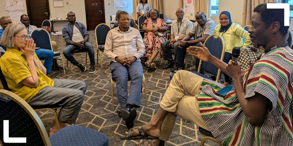 City managers talk to Diana Mitlin in a fishbowl setting